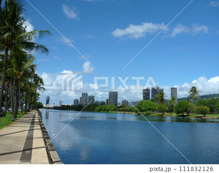 Ala Wai Canal, hotels, Condos, Golf Course and Coconut trees on a nice day in Waikiki 111832126