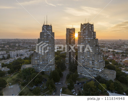 East gate of Belgrade, Silhouette of Brutalist Condominium complex at sunset. Aerial of unique Architecture in Serbia 111834948
