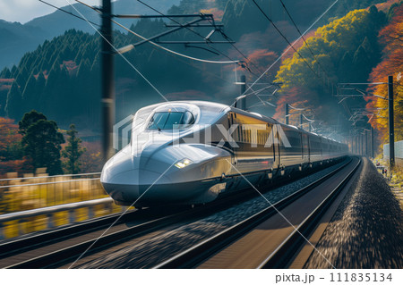 An express train speeds on its route, surrounded by the vibrant colors of autumn foliage in the countryside, blending advanced transportation with the natural beauty of the season. 111835134
