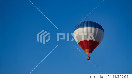 Hot air balloon in the blue sky 111839201