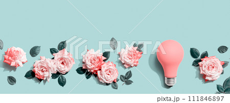 Light bulb with pink roses 111846897