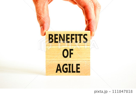 Benefits of agile symbol. Concept words Benefits of agile on beautiful wooden blocks. Beautiful white table white background. Businessman hand. Business benefits of agile concept. Copy space. 111847818