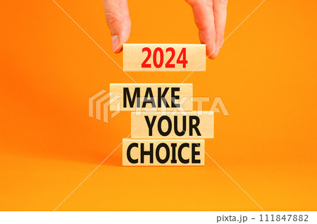 2024 Make your choice symbol. Concept words 2024 Make your choice on beautiful wooden block. Beautiful orange table orange background. Voter hand. Business 2024 Make your choice concept. Copy space. 2024 Make your choice symbol. Concept words 2024 Make your choice on beautiful wooden block. Beautiful orange table orange background. Voter hand. Business 2024 Make your choice concept. Copy space. 111847882