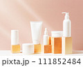 Body care products on the table, sunny composition with white containers and bottles 111852484