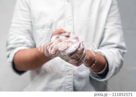 Hands wash procedure, cleaning hands with soap from viruses and contamination. Wash hands before dinner Hands wash procedure, cleaning hands with soap from viruses and contamination. Wash hands before dinner 111852571