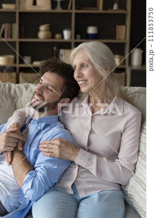 Peaceful grown up son spend time with caring mature mother 111853750