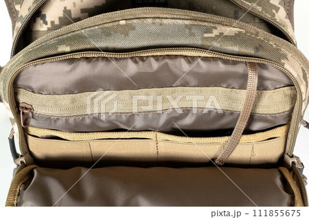Backpack bag gear protective color khaki, tactical sports equipment isolated on white background Backpack bag gear protective color khaki, tactical sports equipment isolated on white background 111855675