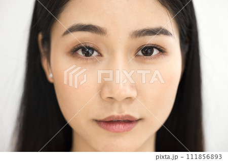 Beautiful female Asian beauty care models face front close up Beautiful female Asian beauty care models face front close up 111856893