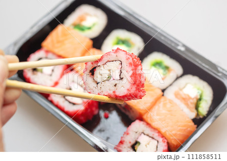 Bright beautiful rolls with fish close up Bright beautiful rolls with fish close up 111858511