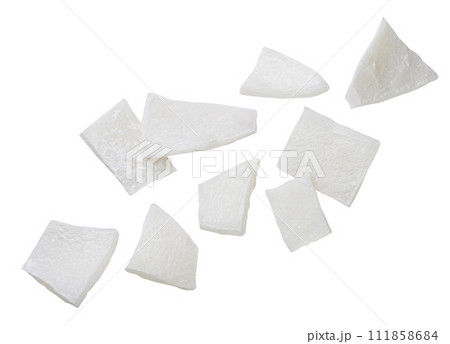 Set of coconut chips flying close-up on a white background. Isolated Set of coconut chips flying close-up on a white background. Isolated 111858684
