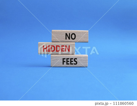 No hidden fees symbol. Concept word No hidden fees on wooden blocks. Beautiful blue background. Business and No hidden fees concept. Copy space 111860560