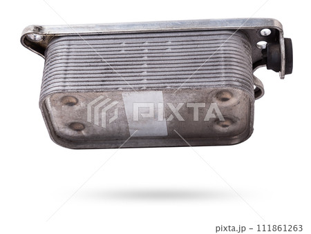 Gearbox heat exchanger - radiator, with metal chrome elements and tubes - detail of a car mechanism on a white isolated background. Replacing the automobile parts. Spare parts catalog. 111861263