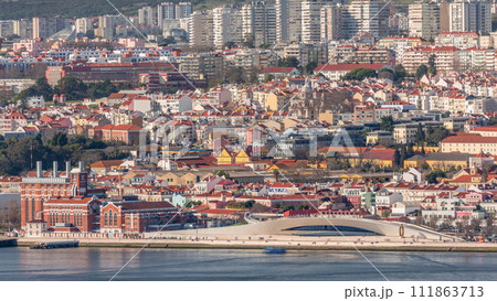 Museu de Arte, Arquitetura and Tecnolocia or MAAT at the Rio Tejo in Belem near museum of electricity aerial timelapse. Lisbon, Portugal Museu de Arte, Arquitetura and Tecnolocia or MAAT at the Rio Tejo in Belem near museum of electricity aerial timelapse. Lisbon, Portugal 111863713