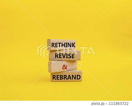 Rethink Revise and Rebrand symbol. Wooden blocks with words Rethink Revise and Rebrand. Beautiful yellow background. Business and Rethink Revise and Rebrand concept. Copy space. Rethink Revise and Rebrand symbol. Wooden blocks with words Rethink Revise and Rebrand. Beautiful yellow background. Business and Rethink Revise and Rebrand concept. Copy space. 111863722