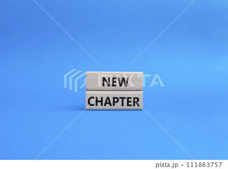 New Chapter symbol. Concept word New Chapter on wooden blocks. Beautiful blue background. Business and New Chapter concept. Copy space 111863757