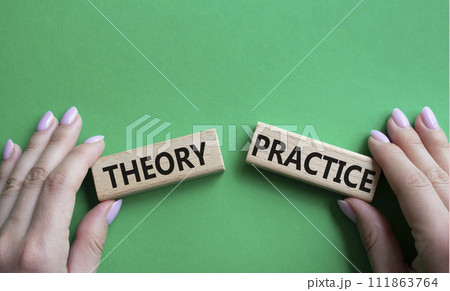 Theory or Practice symbol. Concept word Theory or Practice on wooden blocks. Businessman hand. Beautiful green background. Business and Theory or Practice concept. Copy space Theory or Practice symbol. Concept word Theory or Practice on wooden blocks. Businessman hand. Beautiful green background. Business and Theory or Practice concept. Copy space 111863764