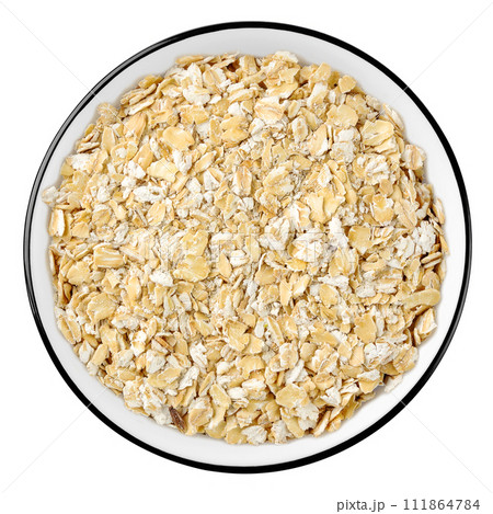 Top view of rolled oats in a bowl isolated on white 111864784
