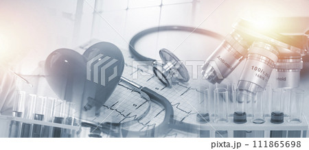 Double exposure microscope and Young woman scientific using equipment in the laboratory for research.Biotechnology,development,chemical,vaccine,Photo concept experimentation and research. 111865698