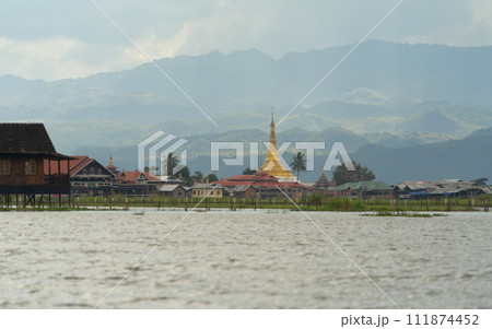 Inle Lake City, The Floating village urban city town houses, lake sea or river. Nature landscape fisheries and fishing tools, Myanmar. Aquaculture farming 111874452
