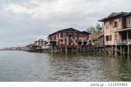 Inle Lake City, The Floating village urban city town houses, lake sea or river. Nature landscape fisheries and fishing tools, Myanmar. Aquaculture farming Inle Lake City, The Floating village urban city town houses, lake sea or river. Nature landscape fisheries and fishing tools, Myanmar. Aquaculture farming 111874465