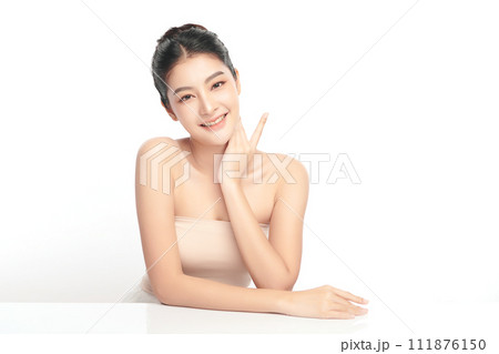 Beautiful young asian woman with clean fresh skin on white background, Face care, Facial treatment, Cosmetology, beauty and spa, Asian women portrait. Beautiful young asian woman with clean fresh skin on white background, Face care, Facial treatment, Cosmetology, beauty and spa, Asian women portrait. 111876150
