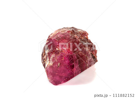 Macro red tourmaline mineral stone on white background Macro red tourmaline mineral stone on white background 111882152