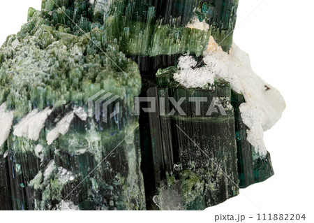 Macro tourmaline mineral stone on white background Macro tourmaline mineral stone on white background 111882204