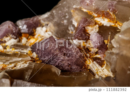 Macro mineral quartz mineral Tourmaline on Lepidolite black background Macro mineral quartz mineral Tourmaline on Lepidolite black background 111882392