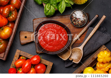 Rich homemade tomato sauce Rich homemade tomato sauce 111883260