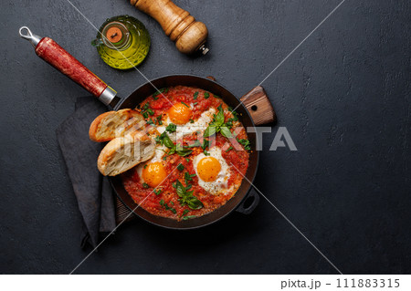 Delicious shakshuka breakfast in a pan 111883315