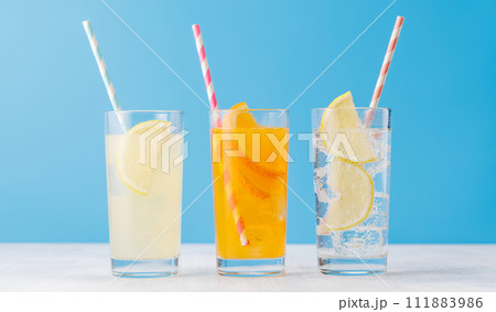 Various lemonade with ice in glasses Various lemonade with ice in glasses 111883986