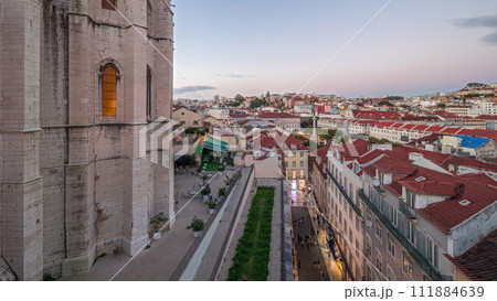 Panorama showing Alfama and Baixa districts of Lisbon aerial day to night timelapse, Portugal 111884639