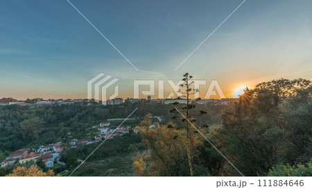 Panorama showing sunset over the Castle of Almourol on hill in Santarem aerial timelapse. Portugal 111884646