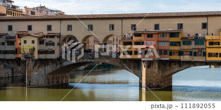 Famous Ponte Vecchio from medieval times in the city center of Florence Famous Ponte Vecchio from medieval times in the city center of Florence 111892055