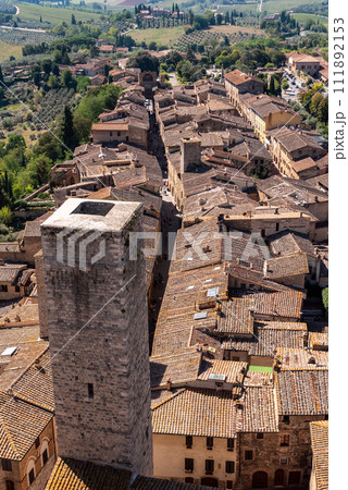 Wide panoramic view over downtown San Gimignano, Torre Ficarelli in the center, seen from Torre Grosso 111892153