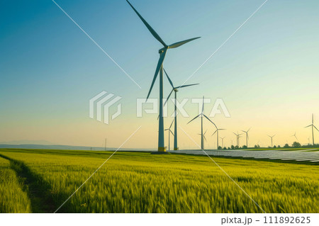 Sustainable Energy Oasis: Wind Turbines and Solar Panels Coexist 111892625