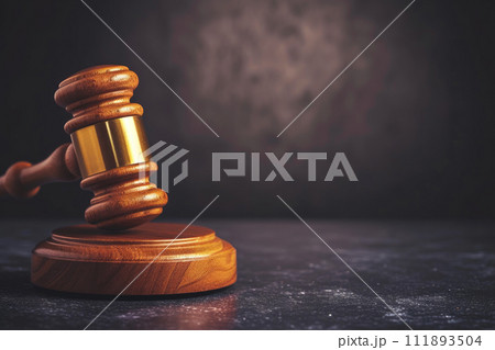 Courtroom Echoes: Gavel Against a Black Background Courtroom Echoes: Gavel Against a Black Background 111893504