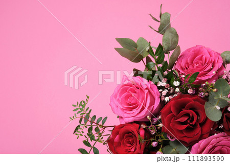 Banner with a bouquet of pink and red roses on magenta background. Space for Your Text Banner with a bouquet of pink and red roses on magenta background. Space for Your Text 111893590