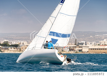 Racing keelboat during regatta competition Racing keelboat during regatta competition 111895972