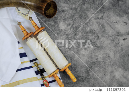 Orthodox Jewish holidays symbols prayer shawls, prayer scrolls torah, shofar 111897291
