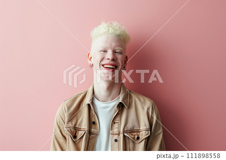Happy Authentic handsome man with fair skin and white hair on a pink background 111898558