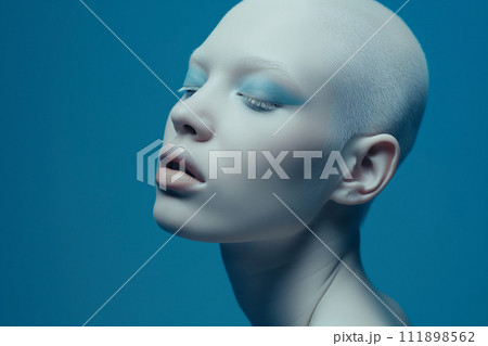 Authentic beautiful woman fashion model with blue eyeshadow. Creative bright summer eye makeup 111898562