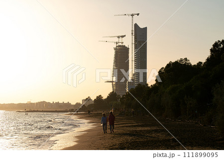 View of Dasoudi seaside park and modern residential skyscrapers construction site. Limassol, Cyprus View of Dasoudi seaside park and modern residential skyscrapers construction site. Limassol, Cyprus 111899095