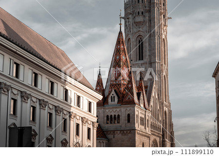 Matthias church in Fisherman bastion at sunset, Budapest, Hungary 111899110