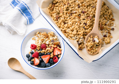 homemade granola with berries and yogurt homemade granola with berries and yogurt 111900291