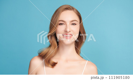 Beautiful young woman with clean fresh skin on blue background, Face care, Facial treatment, Cosmetology, beauty and spa, women portrait. 111905180