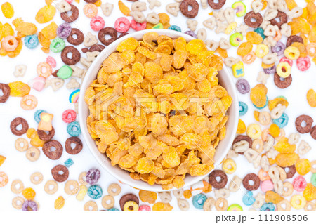 Bowl of corn flex cereals on white background 111908506