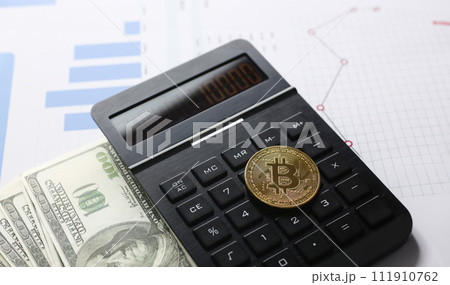 The bitcoin lies on the keyboard of the black 111910762