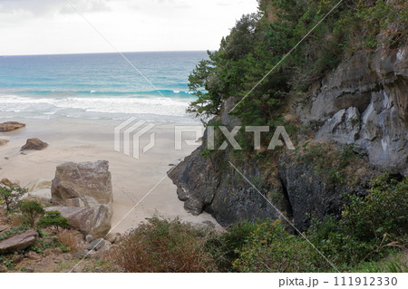 Tatadohama beach at Shimoda on the Izu penninsula of Shizuoka Japan, famous for beautiful white sand, surfing, and nearby onsen hot spring mineral baths 111912330