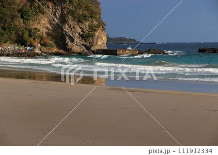 Tatadohama beach at Shimoda on the Izu penninsula of Shizuoka Japan, famous for beautiful white sand, surfing, and nearby onsen hot spring mineral baths 111912334